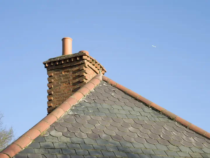 Chimney stack on a slate roof