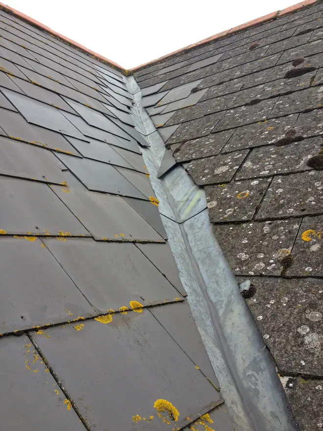 Slate roof valley with lead lining