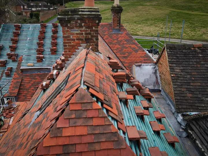 Clay plain tile re-roof in progress seen from above